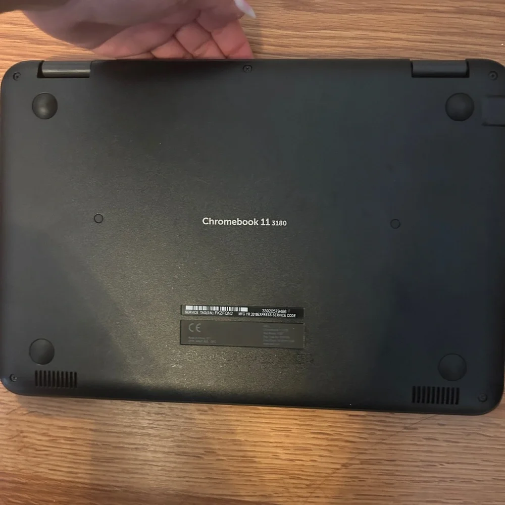 Dell Black Laptop with Matte Finish and Ventilation w/ charger